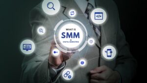 Business professional presenting Social Media Marketing (SMM) concept with digital marketing icons.